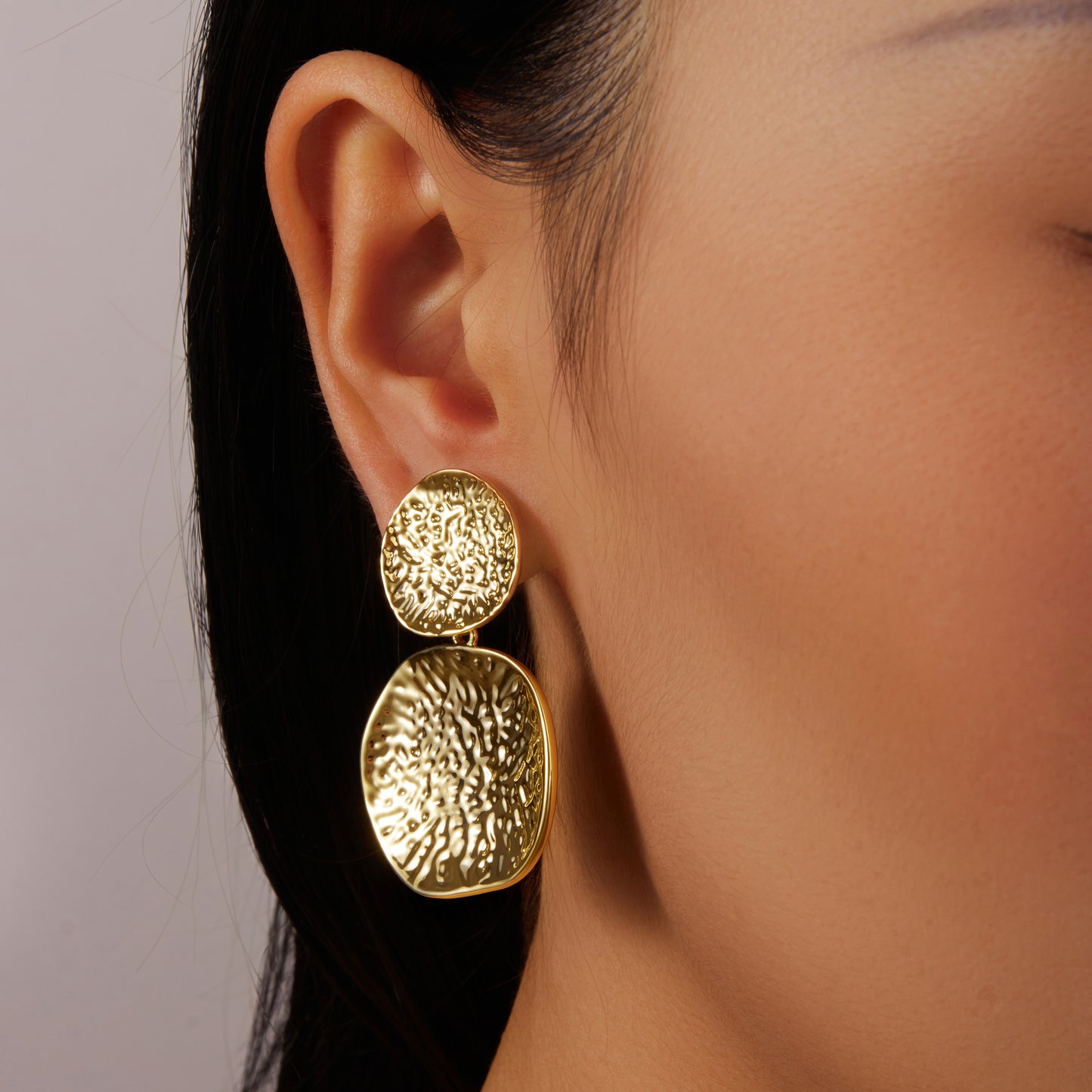 2 gold indented leaves