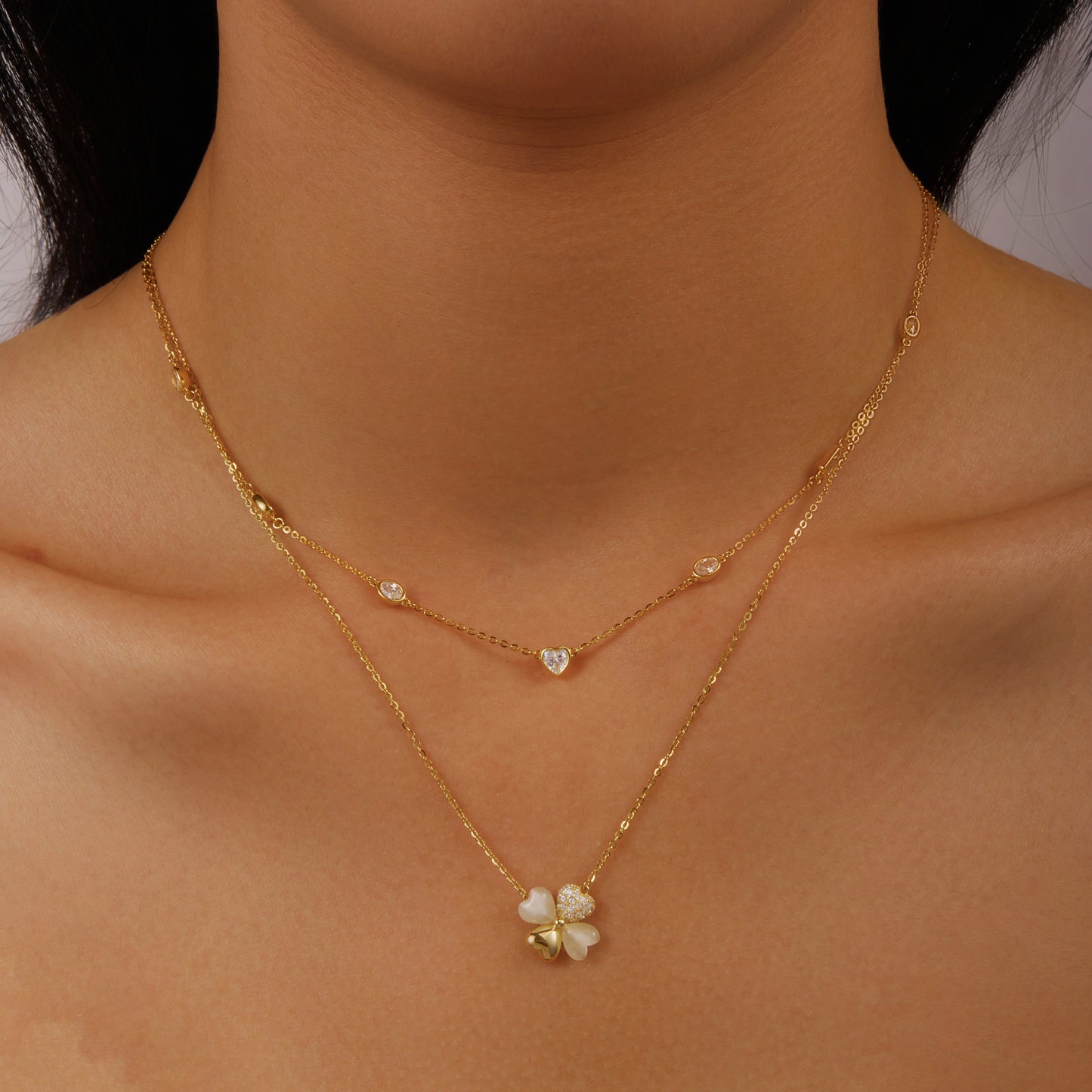 2 gold and 2 white hearts