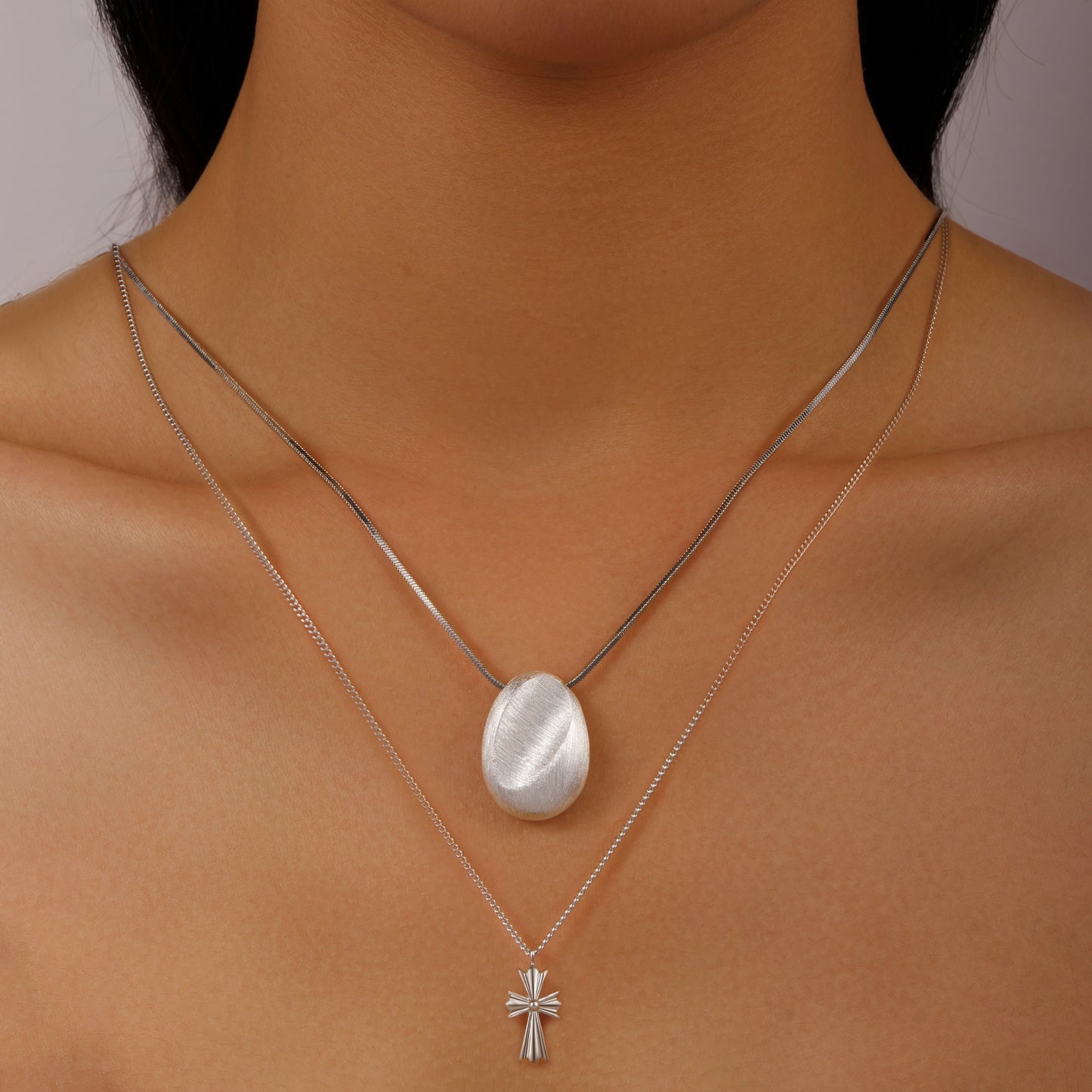 Silver pendant with draw string