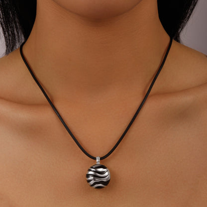 String with silver black pendant