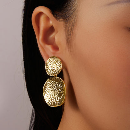 2 gold indented leaves