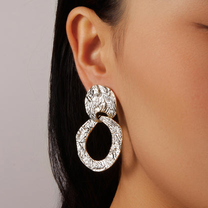 Silver indented leave and loop