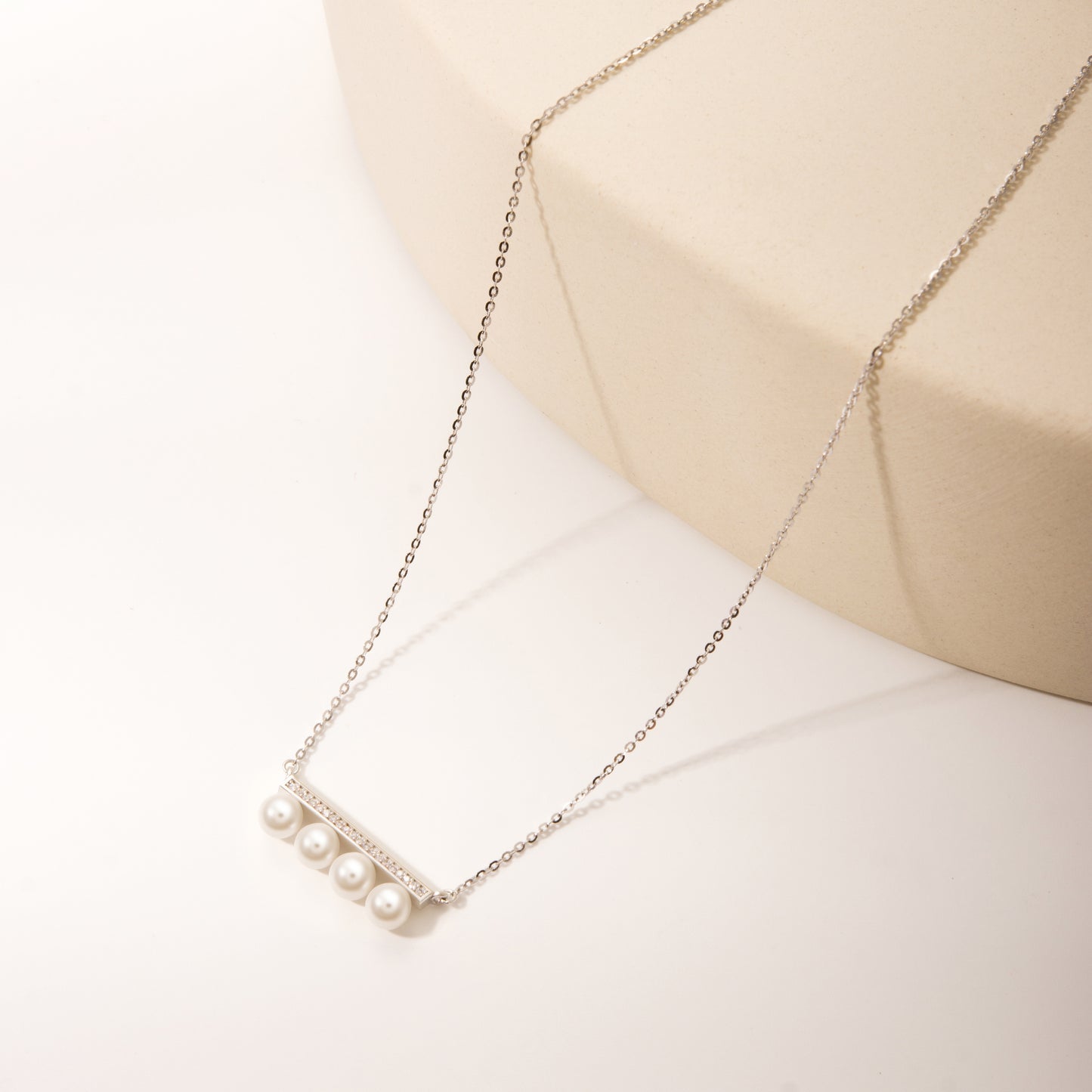 Silver 4 pearls